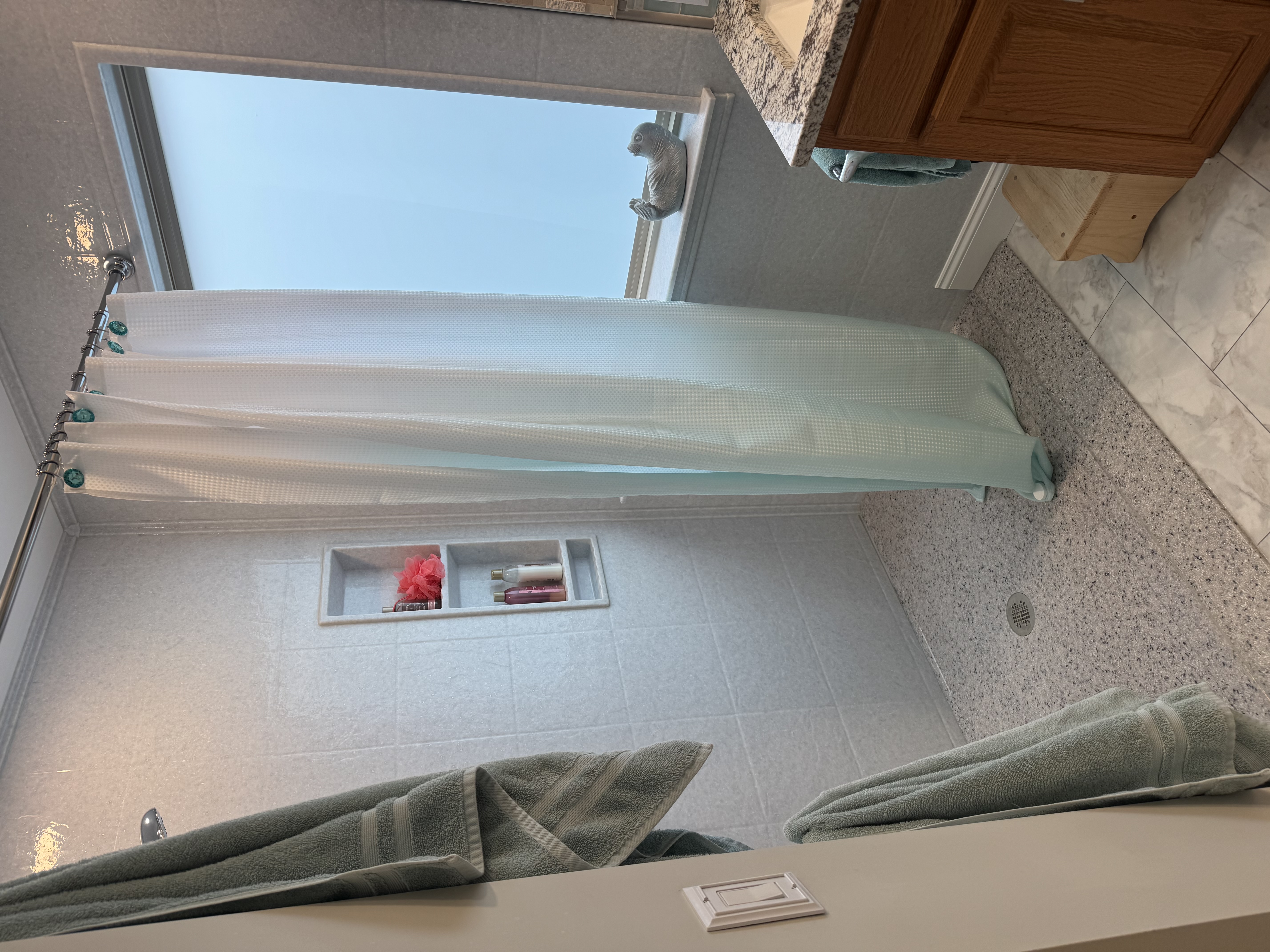 Finished Gessler Onyx solid-surface shower